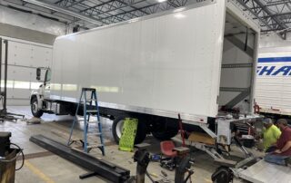Waltco liftgate being installed on a Wabash Truck body -1