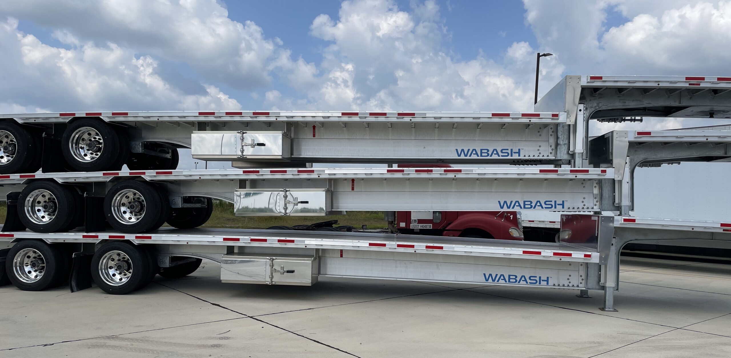 Stack of Step deck Trailers Wabash Step deck Platform Trailers at River-Roads
